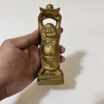 পিতলের Laughing Buddha – সম্পদ, সৌভাগ্য ও ইতিবাচক শক্তির প্রতীক। ঘর, অফিস বা দোকানে রাখলে আনে শান্তি ও সমৃদ্ধি। - Image 4