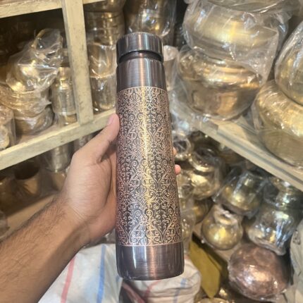 Antique-style engraved pure copper water bottle with Advanced Leak Proof Protection, Ayurveda and Yoga Health Benefits - 900 ml